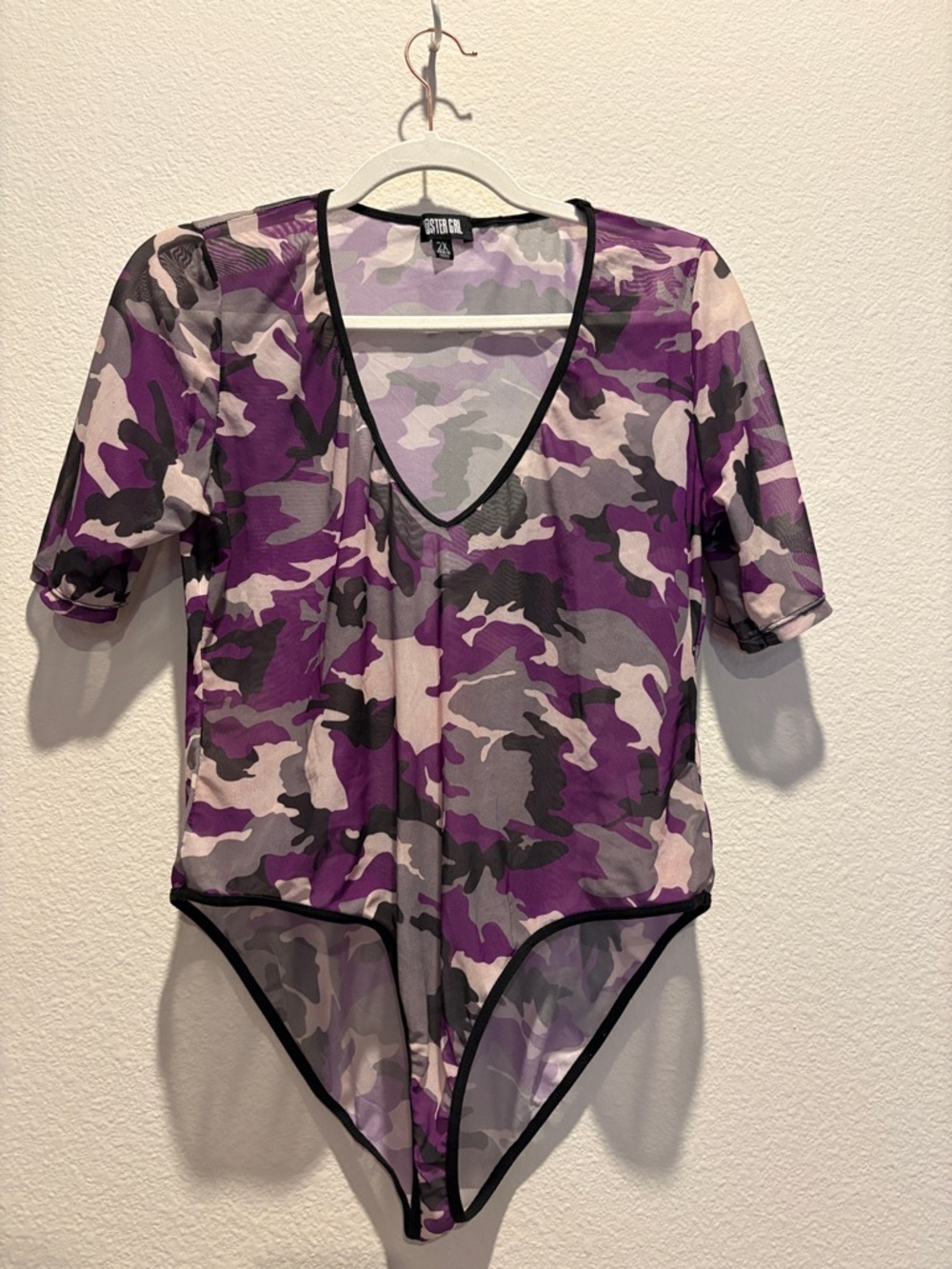 Poster Girl Camouflage sheer mesh bodysuit with short sleeves